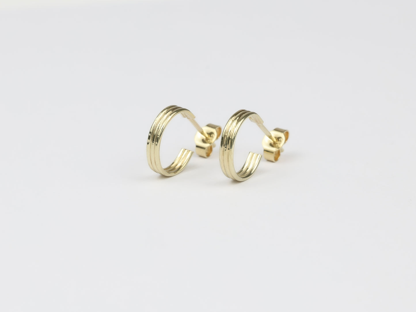 Triple gold earrings